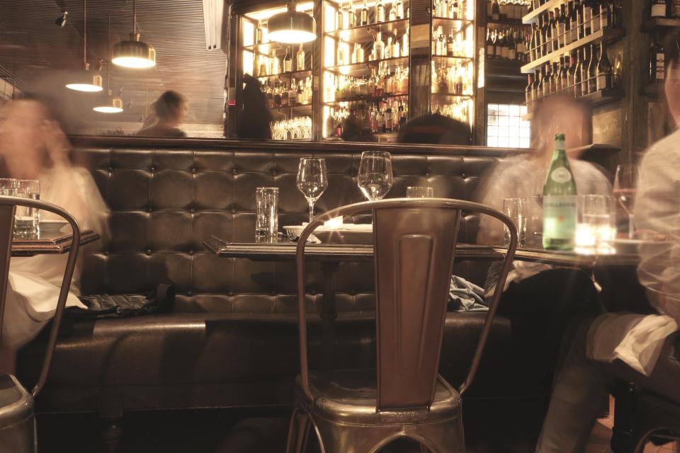 Warmly lit bar seating