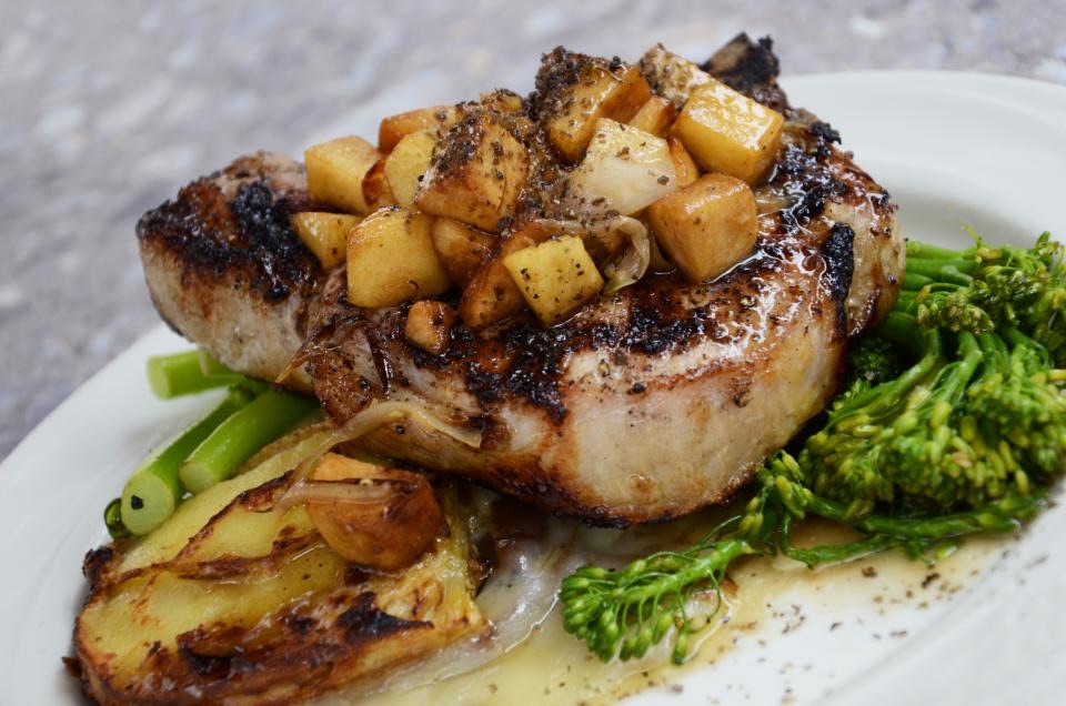 Glazed pork chop with charred greens