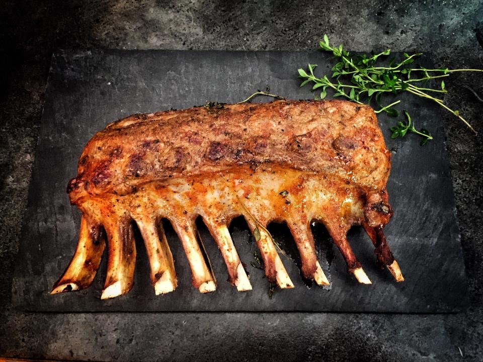 Herb-crusted rack of lamb fresh from the grill